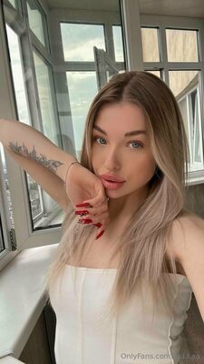 Photo catégorisée avec : Blonde, Mila - m.i.l.aa, OnlyFans, Eyes, Leaked, Tattoo